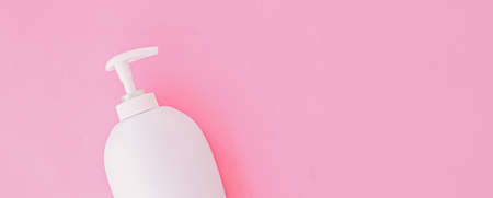 Bottle of antibacterial liquid soap and hand sanitizer on pink background, hygiene product and healthcare, flatlayの写真素材