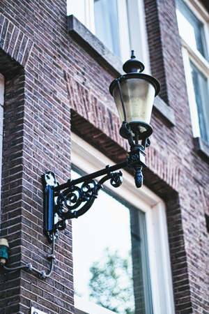 Architectural detail of a building on the main city center street of Amsterdam in Netherlands, european architectureの写真素材