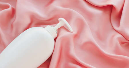 Blank label cosmetic container bottle as product mockup on pink silk background, hygiene and healthcareの写真素材