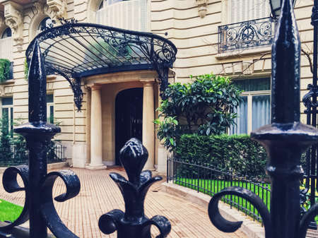 Paris, France circa April, 2019: Parisian parks and gardens, historical architecture on streets of...