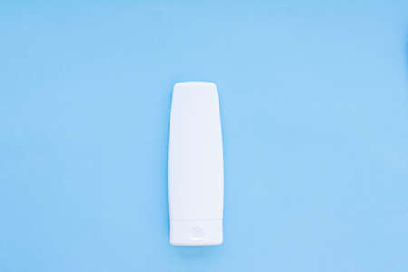 Blank label cosmetic container bottle as product mockup on blue background, hygiene and healthcareの写真素材