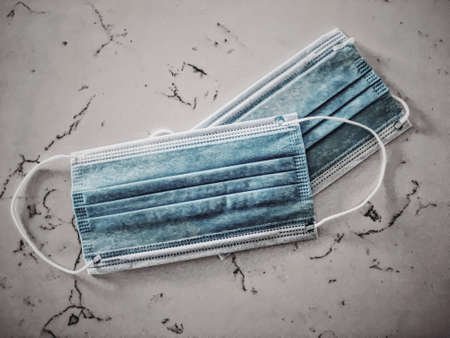 Surgical face masks for preventing infection during coronavirus pandemic, healthcare and hygieneの写真素材