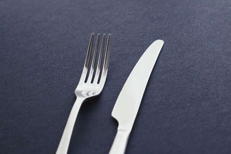 Fork and knife, silver cutlery for table decor, minimalistic design and diet conceptの写真素材