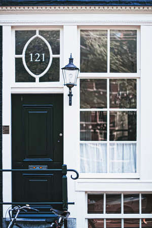 Amsterdam, Netherlands circa April 2020: Architectural detail of a building on the main city center street of Amsterdam in Netherlandsのeditorial素材