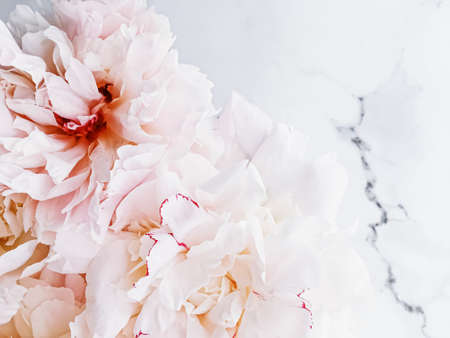 Bouquet of peony flowers on luxury marble background, wedding flatlay and event branding designの写真素材