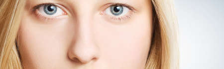 Beauty face close-up of young woman, blonde hair and chic make-up for skincare and haircare brand...