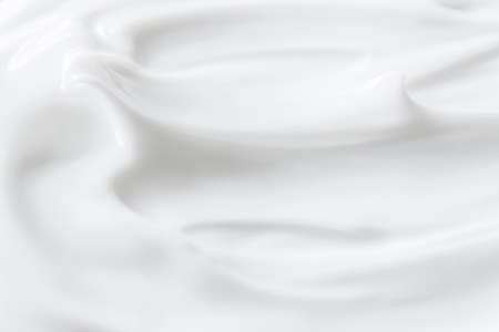 Pure white cream texture as abstract background, food substance or organic cosmeticsの写真素材