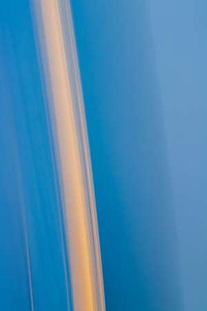 Light waves as abstract futuristic background, science and high tech designsの写真素材