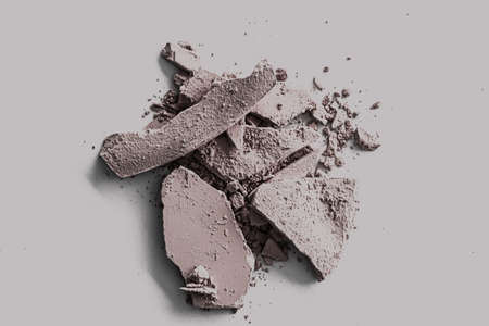 Pale eye shadow powder as makeup palette closeup, crushed cosmetics and beauty texturesの写真素材