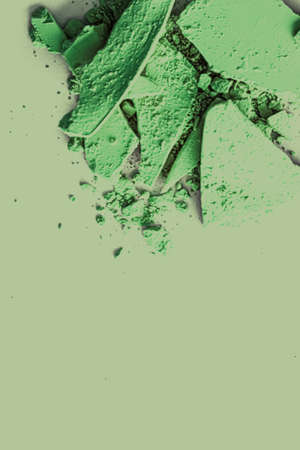 Green eye shadow powder as makeup palette closeup, crushed cosmetics and beauty texturesの写真素材