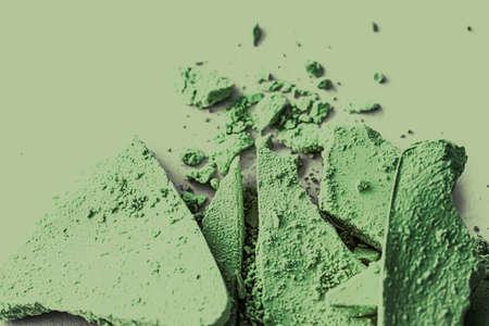 Green eye shadow powder as makeup palette closeup, crushed cosmetics and beauty texturesの写真素材