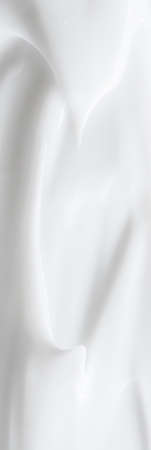 Pure white cream texture as abstract background, food substance or organic cosmetics