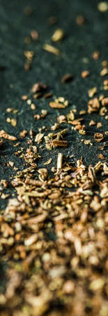 Provencal spices mix closeup on luxury stone background as flat lay, dry food spices and recipe...