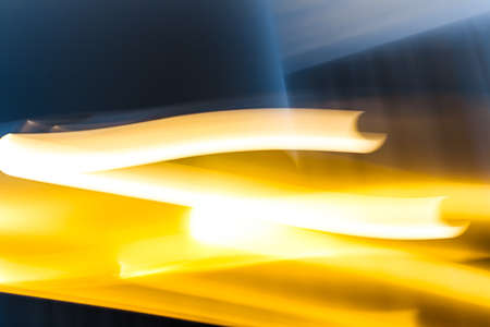Light waves as abstract futuristic background, science and high tech designsの写真素材