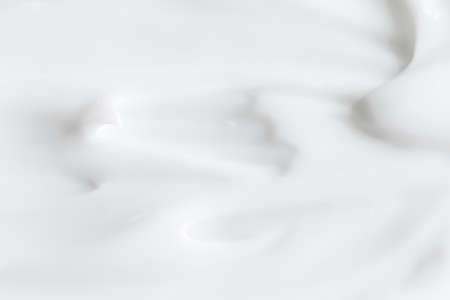 Pure white cream texture as abstract background, food substance or organic cosmeticsの写真素材