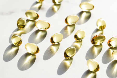 Omega 3 fish oil capsules for healthy diet nutrition, pharma brand store, probiotic drug pills as healthcare or supplement products for pharmaceutical industry adsの写真素材