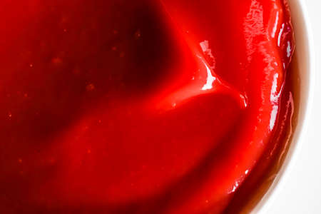 Organic ketchup, tomato sauce closeup, food background and homemade recipesの写真素材