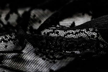 Black lace texture, fabric and textile backgroundsの写真素材
