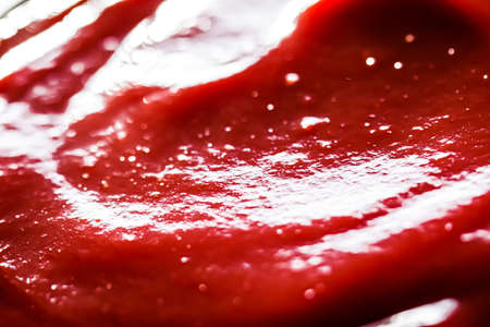 Organic ketchup, tomato sauce closeup, food background and homemade recipesの写真素材