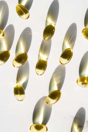 Omega 3 fish oil capsules for healthy diet nutrition, pharma brand store, probiotic drug pills as healthcare or supplement products for pharmaceutical industry adsの写真素材