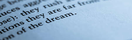 Blue toned macro closeup of an open book, education and studiesの写真素材