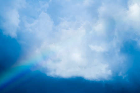 Rainbow in a dreamy blue sky, spiritual and nature backgroundsの写真素材
