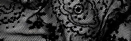 Black lace texture, fabric and textile backgroundsの写真素材
