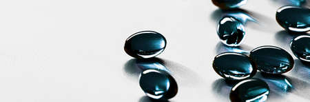 Blue herbal capsules for healthy diet nutrition, pharma brand store, probiotic drug pills as healthcare or supplement products for pharmaceutical industry adsの写真素材