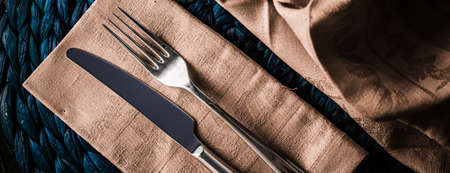 Table scape, menu and interior concept - Holiday table setting with beige napkin and silver cutlery, food styling props, vintage set for wedding, event, date, party or luxury home decor brand designの写真素材