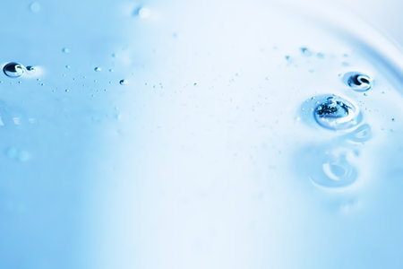 Blue gel lotion texture as cosmetics background, hygiene and science closeup