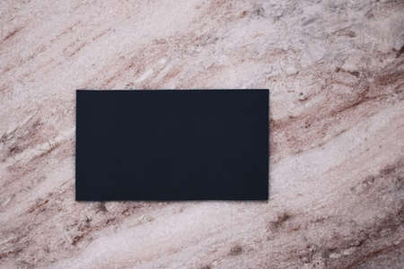 Black business card flatlay on stone background, luxury branding flat lay and brand identity design...