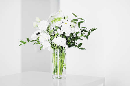 Bouquet of flowers in vase and home decor details, luxury interior designの写真素材