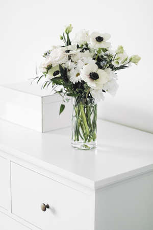 Bouquet of flowers in vase and home decor details, luxury interior designの写真素材