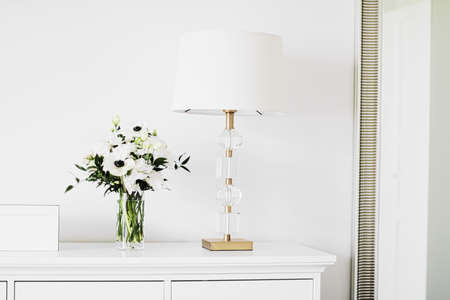 Bouquet of flowers in vase and home decor details, luxury interior designの写真素材