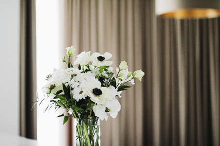 Bouquet of flowers in vase and home decor details, luxury interior designの写真素材