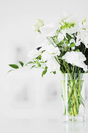 Bouquet of flowers in vase and home decor details, luxury interior designの写真素材
