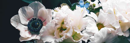 Flower bouquet on black background, beautiful floral arrangement, creative flowers and floristic...
