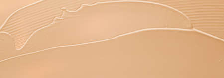 Beige cosmetic texture background, make-up and skincare cosmetics product, cream, lipstick,...