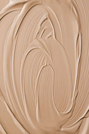 Beige cosmetic texture background, make-up and skincare cosmetics product, cream, lipstick,...