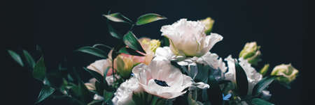 Flower bouquet on black background, beautiful floral arrangement, creative flowers and floristic...