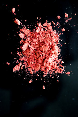 Crushed cosmetics, mineral organic eyeshadow, blush and cosmetic powder isolated on black background, makeup and beauty banner, flatlay designの写真素材