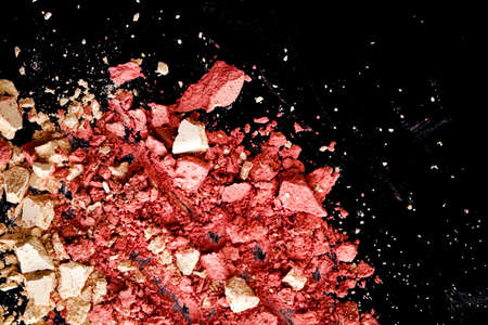 Crushed cosmetics, mineral organic eyeshadow, blush and cosmetic powder isolated on black background, makeup and beauty banner, flatlay designの写真素材