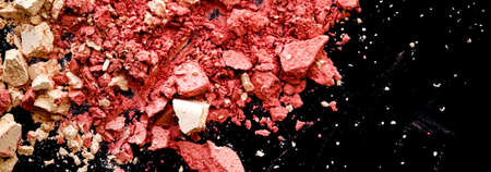 Crushed cosmetics, mineral organic eyeshadow, blush and cosmetic powder isolated on black background, makeup and beauty banner, flatlay designの写真素材