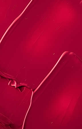 Red lipstick or lip gloss texture as cosmetic background, makeup and beauty cosmetics product for luxury brand, holiday flatlay backdrop or abstract wall art and paint strokesの写真素材
