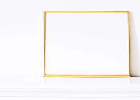 Golden frame on white furniture, luxury home decor and design for mockup, poster print and printable art, online shop showcaseの写真素材