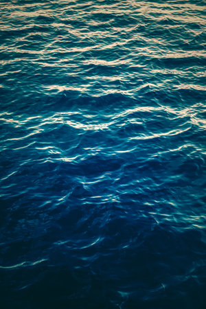 Deep blue ocean water texture, dark sea waves background as nature and environmental designの写真素材