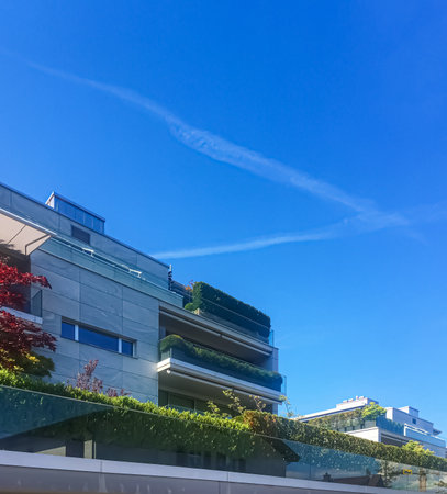Modern apartment buildings and street in Wollerau, canton of Schwyz in Switzerland, Swiss architecture and real estateのeditorial素材
