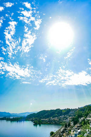 Lake Zurich in Wollerau, canton of Schwyz in Switzerland, Zurichsee, Swiss mountains landscape, blue...