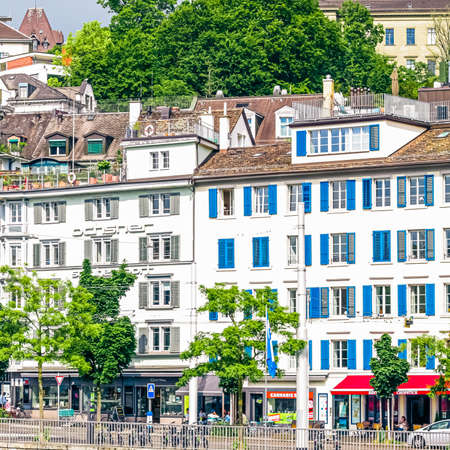Streets and historic Old Town buildings near main railway train station Zurich HB, Hauptbahnhof, Swiss architecture and travel destination in Zurich, Switzerlandのeditorial素材