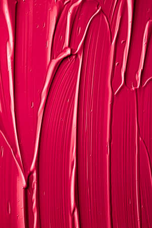 Red lipstick or lip gloss texture as cosmetic background, makeup and beauty cosmetics product for luxury brand, holiday flatlay backdrop or abstract wall art and paint strokesの写真素材
